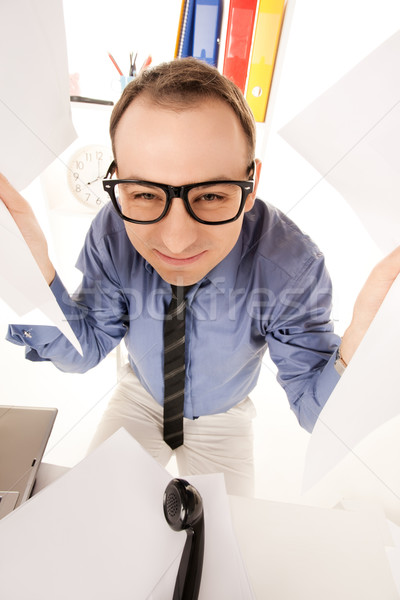 funny picture of businessman in office Stock photo © dolgachov