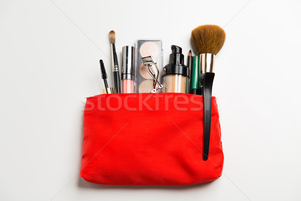 close up of cosmetic bag with makeup stuff Stock photo © dolgachov