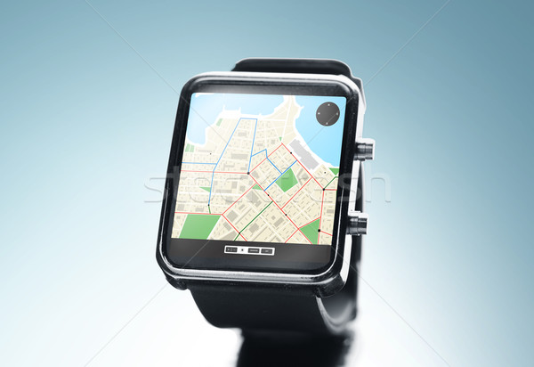 close up of smart watch with gps navigation app Stock photo © dolgachov