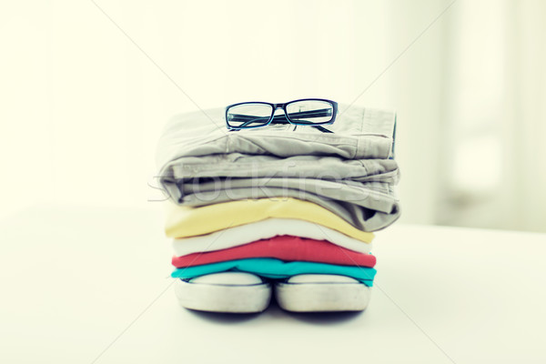 close up of clothes and accessories on table Stock photo © dolgachov