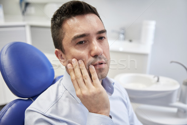 Foto stock: Hombre · dolor · de · muelas · sesión · dentales · silla · personas