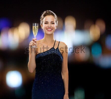 happy young women dancing at night club disco Stock photo © dolgachov