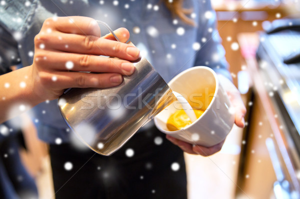 close up of woman making coffee at shop or cafe Stock photo © dolgachov