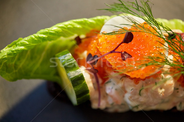 close up of toast skagen with caviar and bread Stock photo © dolgachov
