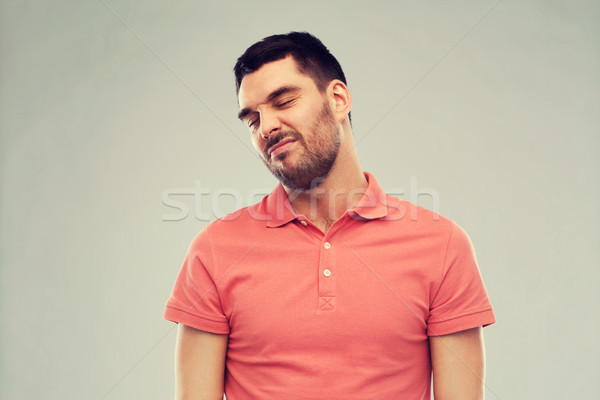 man wrying over gray background Stock photo © dolgachov