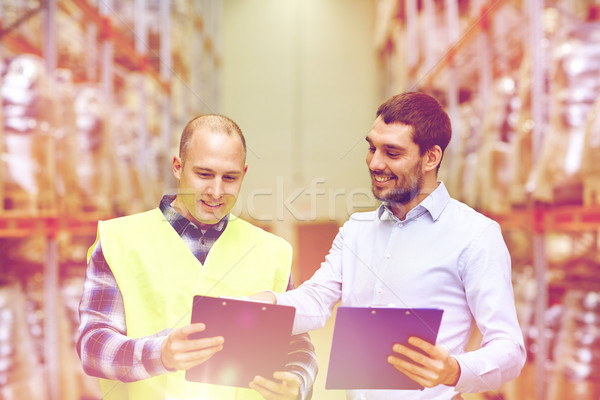 Lucrător oameni de afaceri clipboard depozit oameni Imagine de stoc © dolgachov