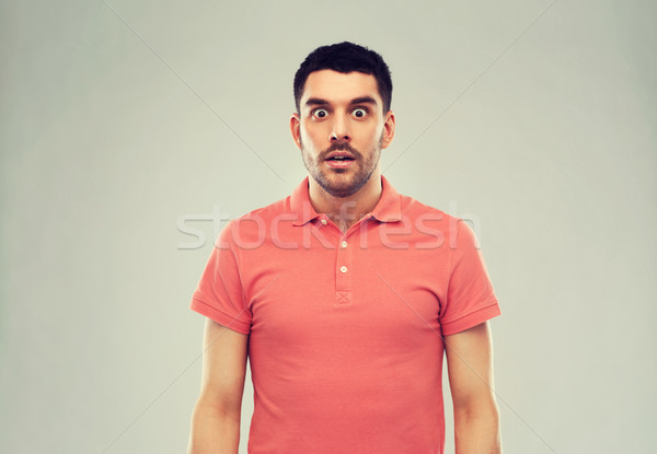 şaşırmış adam tshirt gri duygu Filmi Stok fotoğraf © dolgachov