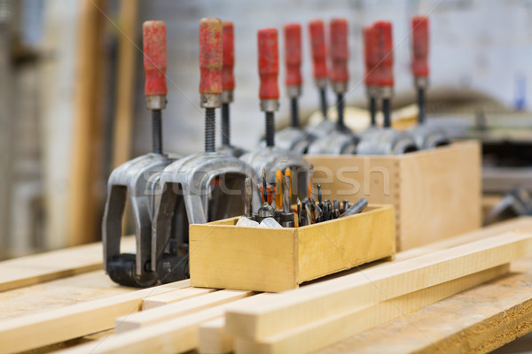 drills and woodworking tools at workshop Stock photo © dolgachov