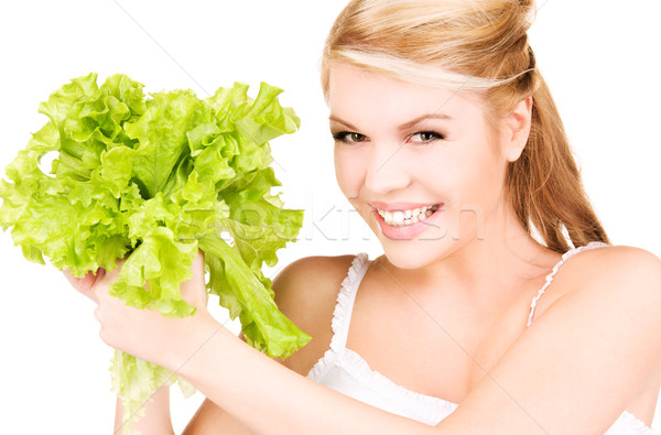 Stock photo: happy woman with lettuce