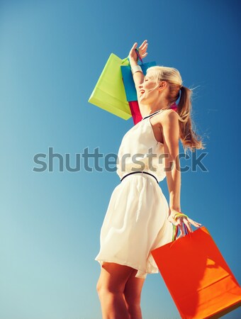 happy woman with yellow sarong on the beach Stock photo © dolgachov