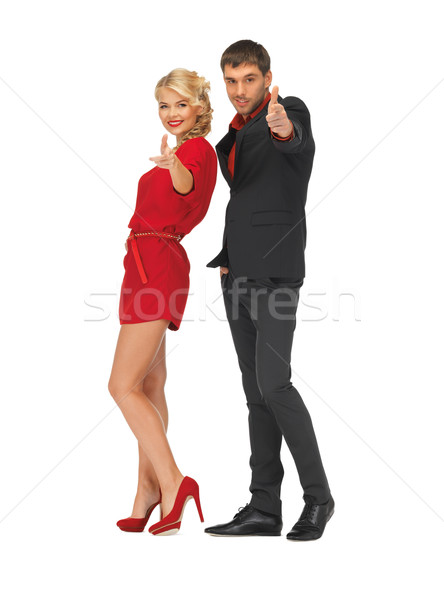 man and woman making a gun gesture Stock photo © dolgachov