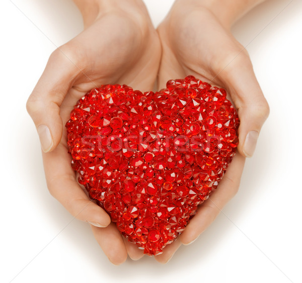 woman hands holding heart Stock photo © dolgachov