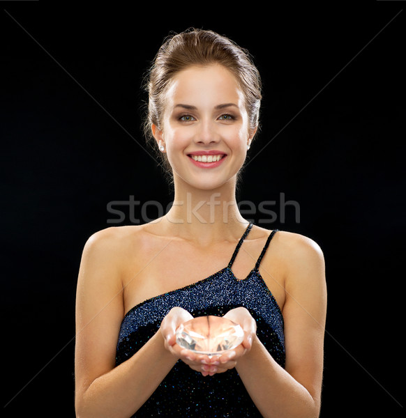 Glimlachende vrouw avondkleding mensen vakantie glamour zwarte Stockfoto © dolgachov