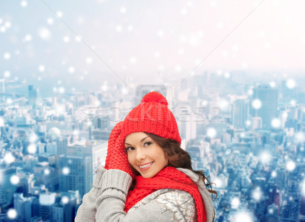 smiling young woman in winter clothes Stock photo © dolgachov