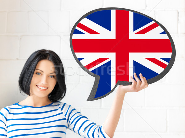 smiling woman with text bubble of british flag Stock photo © dolgachov