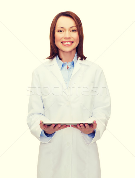 smiling female doctor and tablet pc computer Stock photo © dolgachov