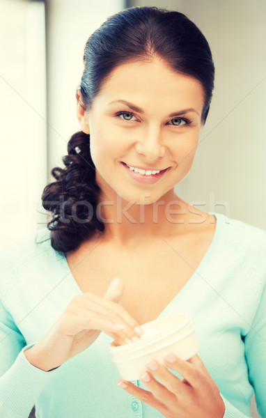 Gyönyörű nő hidratáló kép nő arc haj Stock fotó © dolgachov
