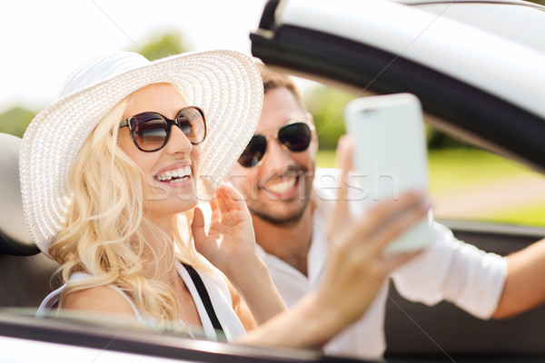 Stockfoto: Gelukkig · paar · auto · smartphone · weg