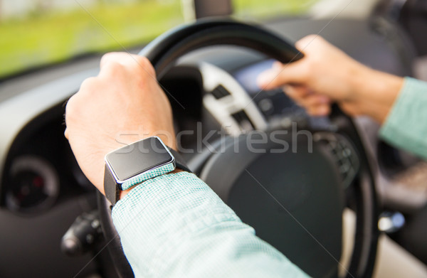 Közelkép férfi karóra vezetés autó szállítás Stock fotó © dolgachov