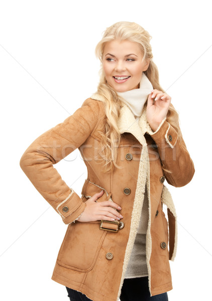 beautiful woman in sheepskin jacket Stock photo © dolgachov