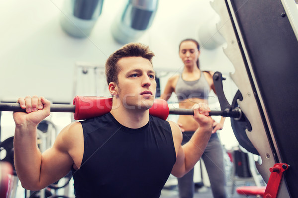 Stockfoto: Man · vrouw · barbell · spieren · gymnasium · sport