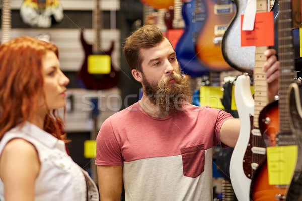 Foto stock: Casal · músicos · guitarra · música · armazenar · venda