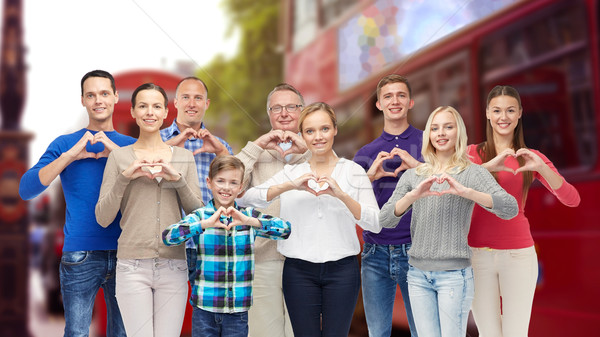 people showing heart hand sign over london city Stock photo © dolgachov