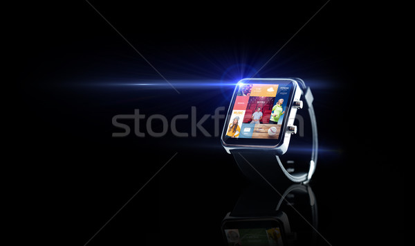 close up of smart watch with media application Stock photo © dolgachov