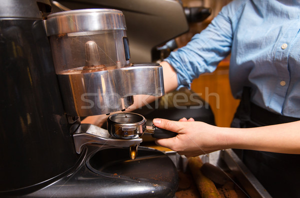 close up of woman making coffee by machine at cafe Stock photo © dolgachov
