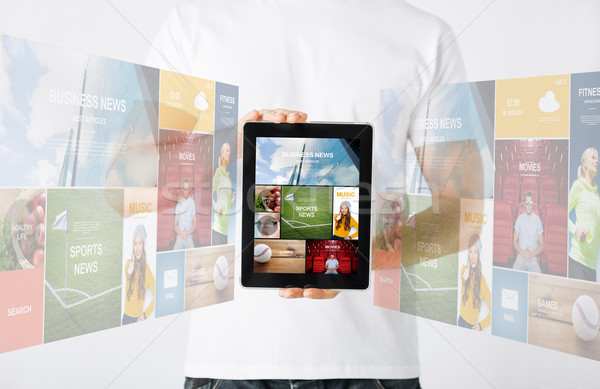 close up of man with tablet pc and web pages Stock photo © dolgachov