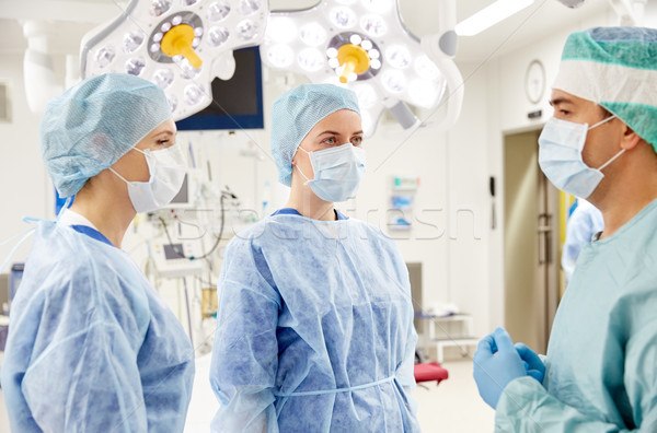 Grupo cirujanos sala de operaciones hospital cirugía medicina Foto stock © dolgachov