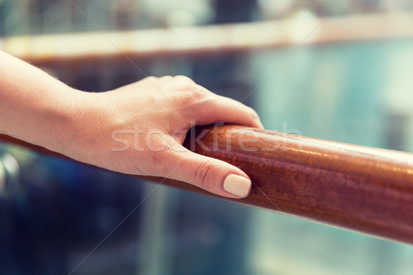 close up of woman hand holding to railing Stock photo © dolgachov