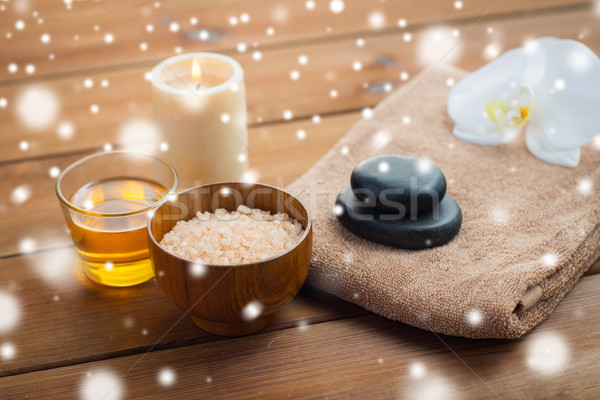 himalayan pink salt with honey and bath towel Stock photo © dolgachov