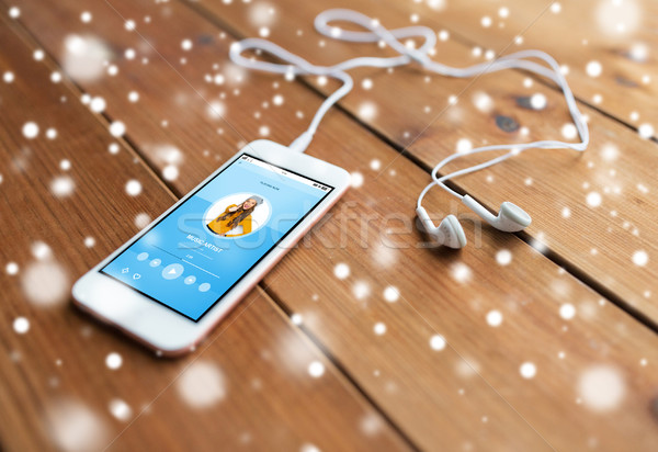 Közelkép okostelefon fülhallgató fa technológia zene Stock fotó © dolgachov