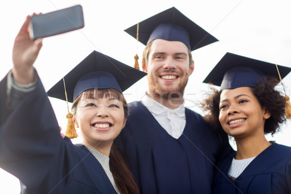 Foto stock: Estudantes · solteiros · educação · graduação
