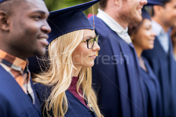 Fericit studenţi burlaci educaţie absolvire oameni Imagine de stoc © dolgachov