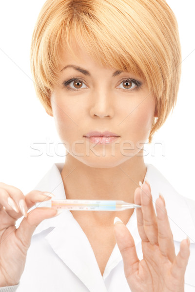 Atrakcyjna kobieta lekarza termometr zdjęcie kobieta kobiet Zdjęcia stock © dolgachov