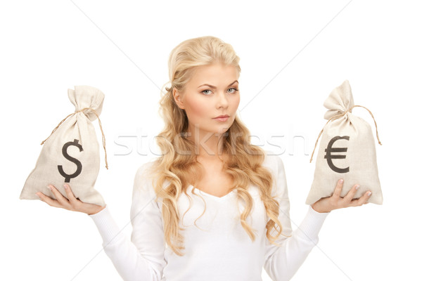 Nő Euro dollár szatyrok kép pénz Stock fotó © dolgachov