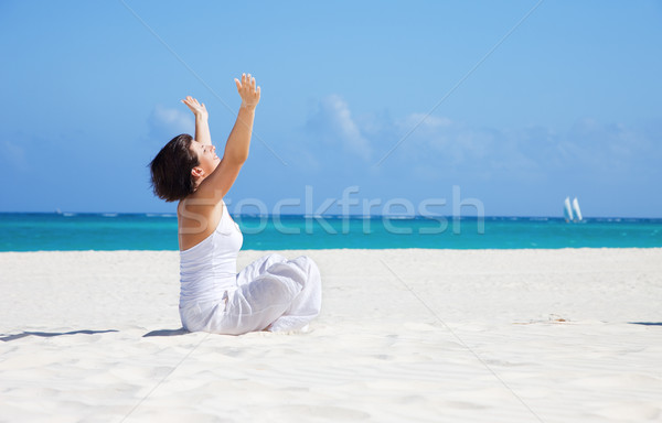 meditation on the beach Stock photo © dolgachov