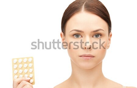 Młodych piękna kobieta pigułki zdjęcie kobieta medycznych Zdjęcia stock © dolgachov