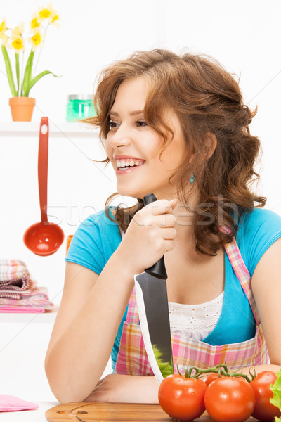 beautiful woman in the kitchen Stock photo © dolgachov