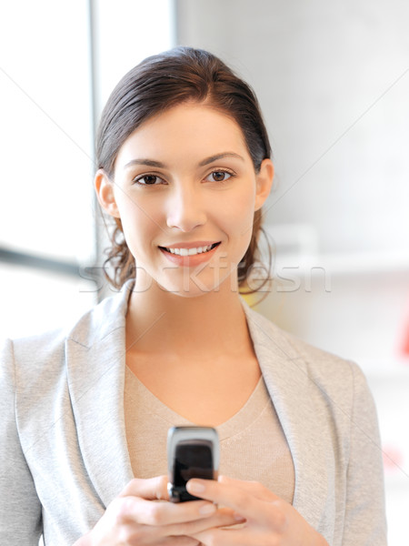 Stockfoto: Zakenvrouw · mobiele · telefoon · heldere · foto · vrouw · telefoon