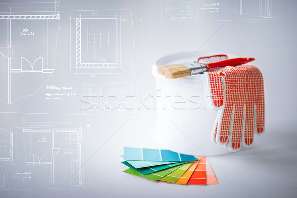 paintbrush, paint pot, gloves and pantone samplers Stock photo © dolgachov