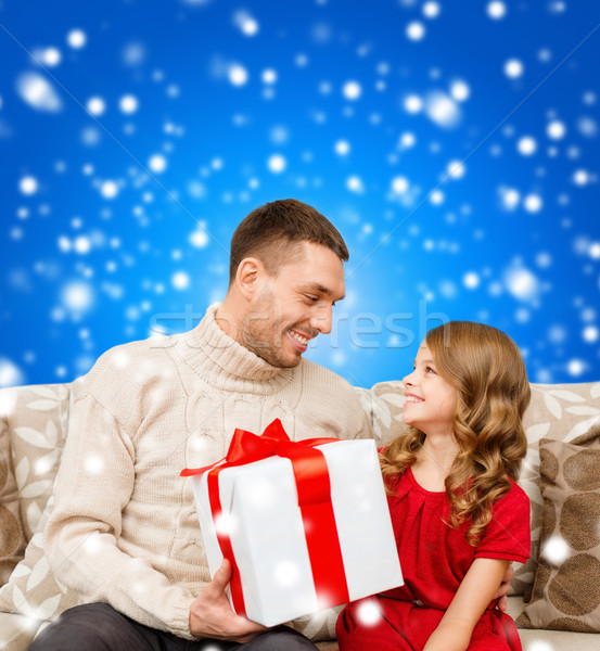 smiling father and daughter looking at each other Stock photo © dolgachov