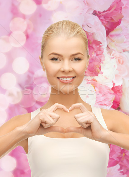 Sonriendo forma de corazón gesto amor Foto stock © dolgachov
