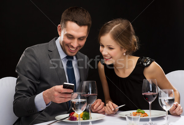 笑みを浮かべて カップル 食べ レストラン 技術 ストックフォト © dolgachov