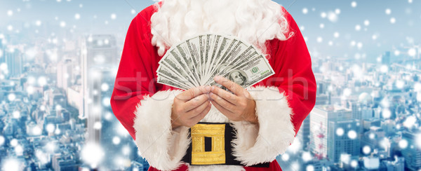 close up of santa claus with euro money Stock photo © dolgachov