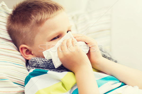 Stock photo: ill boy with flu at home