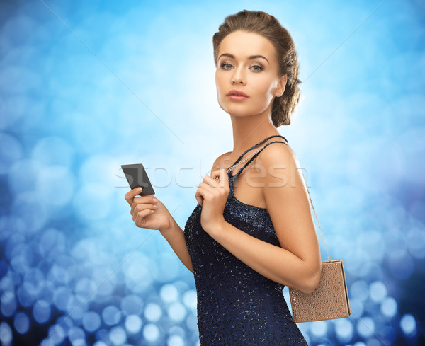 beautiful woman in evening dress with vip card Stock photo © dolgachov