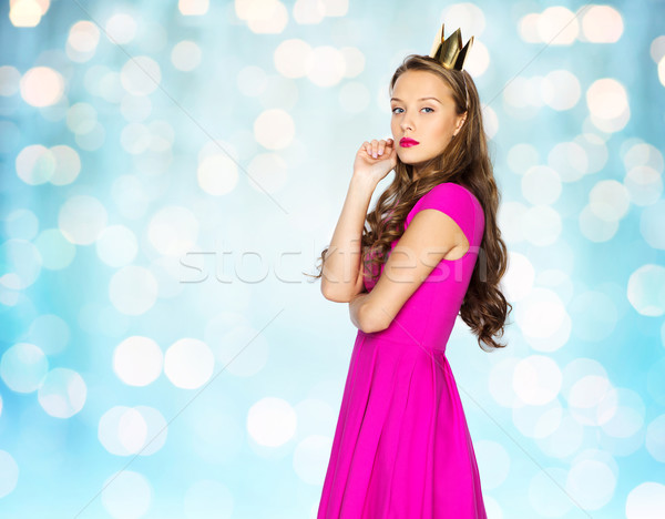 young woman or teen girl in pink dress Stock photo © dolgachov